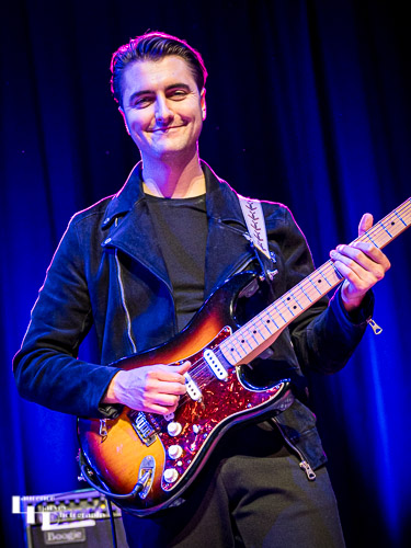 Brett Smit-Daniels on guitar