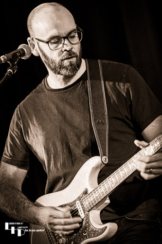 Paul Turley on vocals and guitar