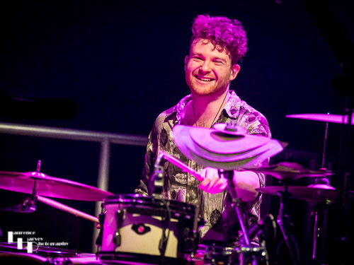 Zachariah O'Loughlin on drums