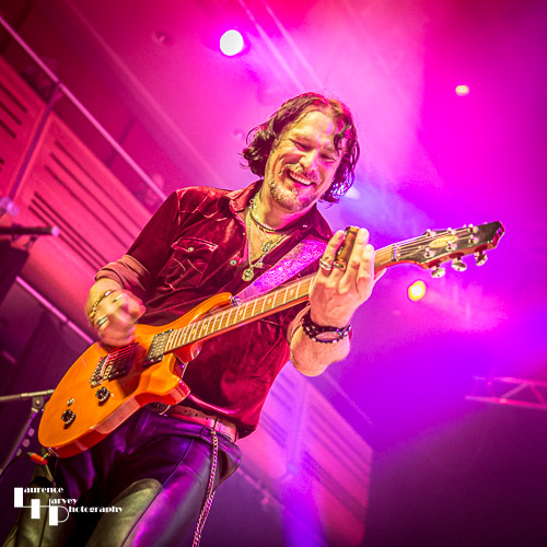 Aaron Bond on guitar & vocals