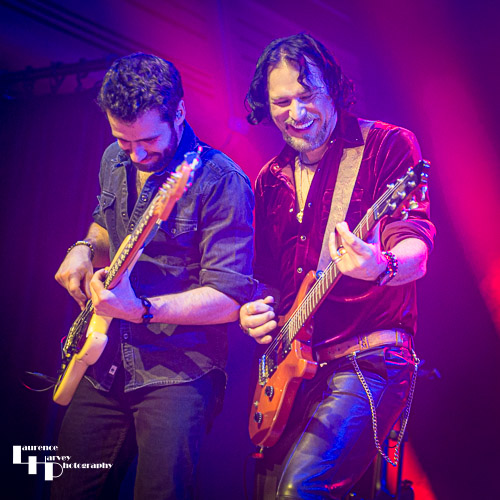 Aaron Bond on guitar & Adam Bowers on bass