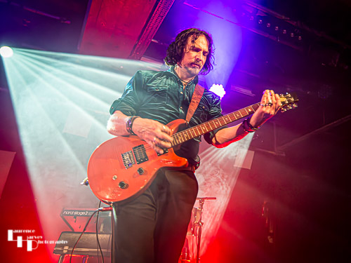 Aaron Bond on guitar & vocals