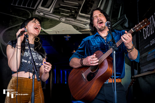 Grace Bond on vocals, Aaron Bond on guitar & vocals at the pre-show Meet & Greet