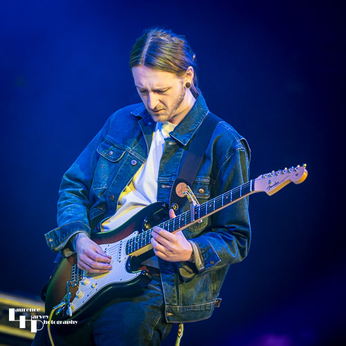 Ashley Sherlock on guitar & vocals