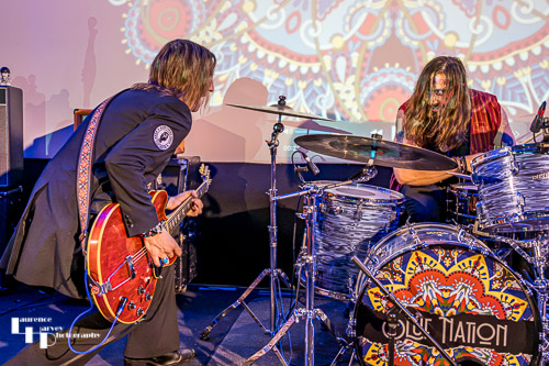 Neil Murdoch on guitar, Nick Sharman on drums