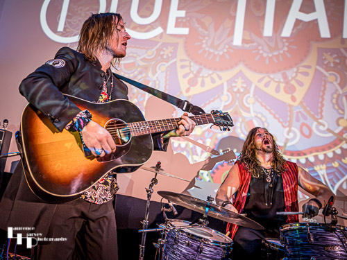 Neil Murdoch on guitar, Nick Sharman on drums