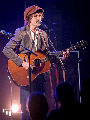 Greene on vocals & guitar