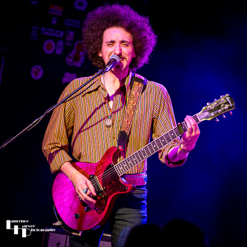 Henry James (Schneekluth) on backing vocals & guitar