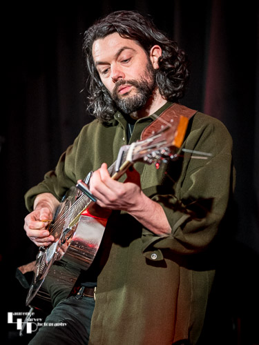 James Cameron on vocals & guitar