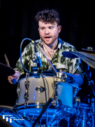 Zac O'Loughlin on drums