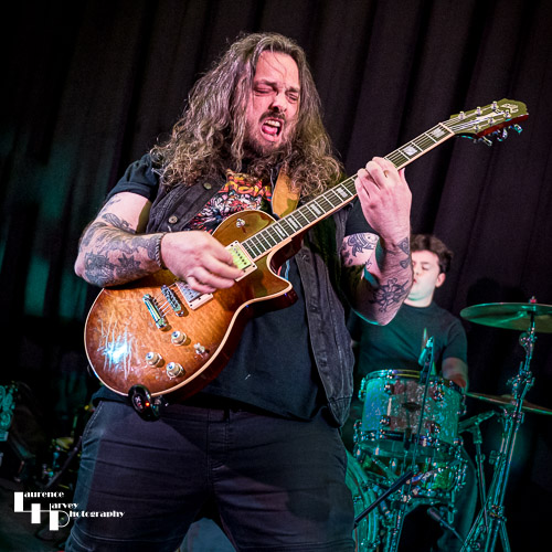 Aiden Pryor on guitar & vocals