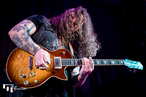 Aiden Pryor on guitar & vocals