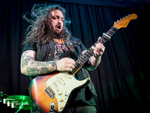 Aiden Pryor on guitar & vocals