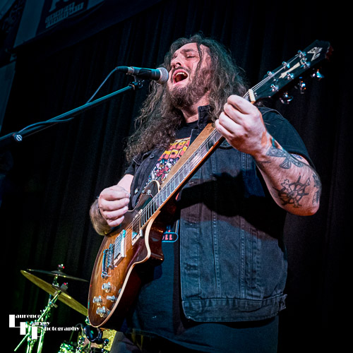 Aiden Pryor on guitar & vocals