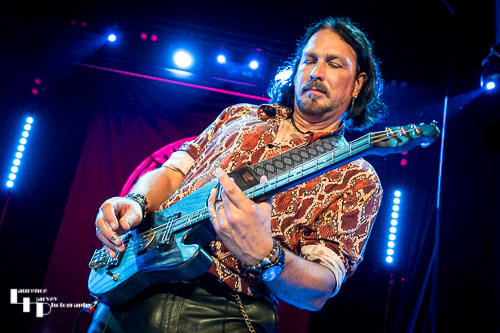 Aaron Bond on guitar & vocals
