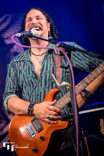 Aaron Bond on guitar & vocals