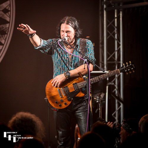Aaron Bond on guitar & vocals