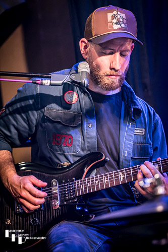 James Fox on percussion, guitar & backing vocals