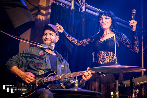 Grace Bond on vocals, James 'Foxy' Fox on percussion & guitar