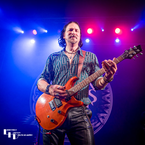 Aaron Bond on guitar & vocals