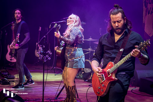 Georgia Nevada & her band on stage at The Apex