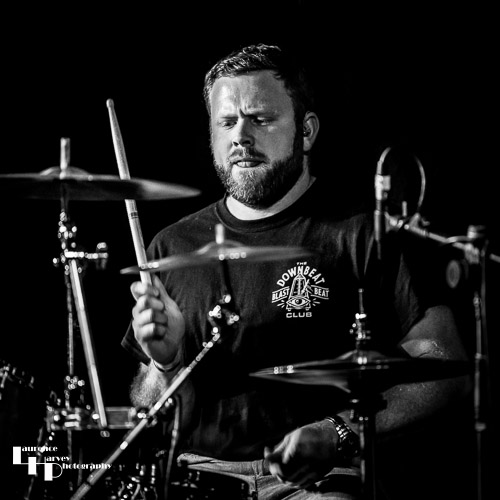 Aaron Oakley on drums