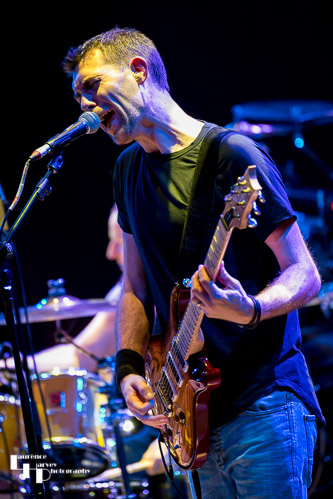 Joe Fawcett on guitar & vocals