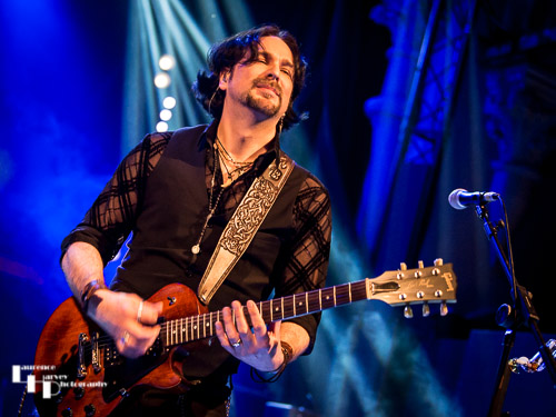 Aaron Bond on guitar & vocals