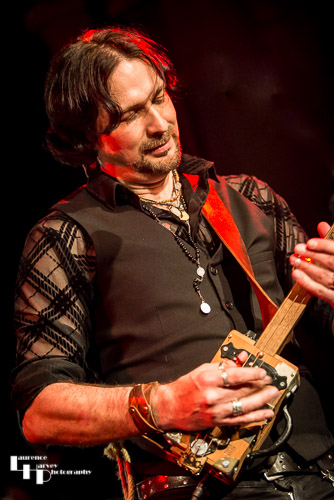 Aaron Bond on cigar box guitar & vocals