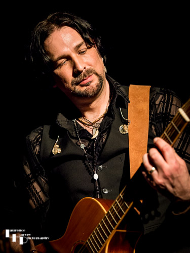 Aaron Bond on guitar & vocals