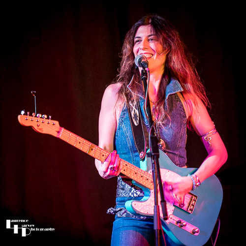 Susan Santos on guitar & vocals