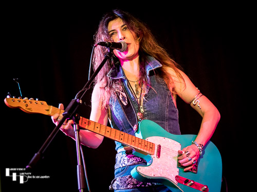 Susan Santos on guitar & vocals