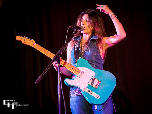 Susan Santos on guitar & vocals