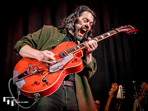 James Cameron on vocals & guitar