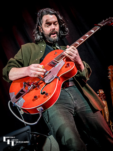 James Cameron on vocals & guitar
