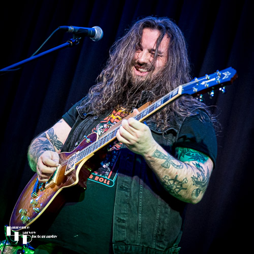 Aiden Pryor on guitar & vocals