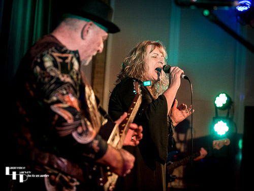 Chrissy Sands on vocals, Rob Sands on guitar