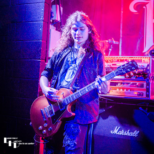Tyler Arrowsmith on guitar