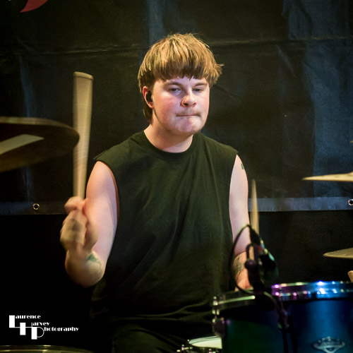 Loz Riley on drums