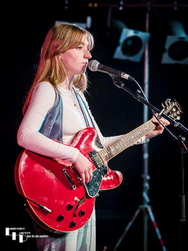 Kitty Perrin on vocals & guitar