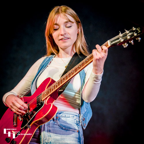 Kitty Perrin on vocals & guitar