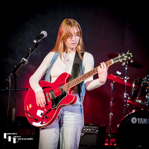 Kitty Perrin on vocals & guitar