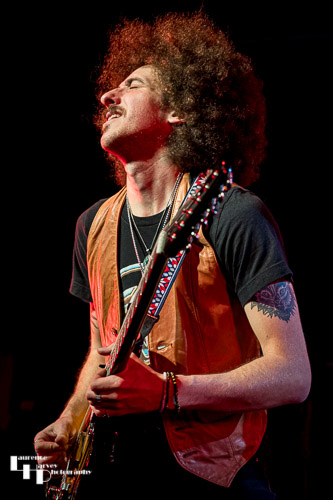 Henry James (Schneekluth) on backing vocals & guitar