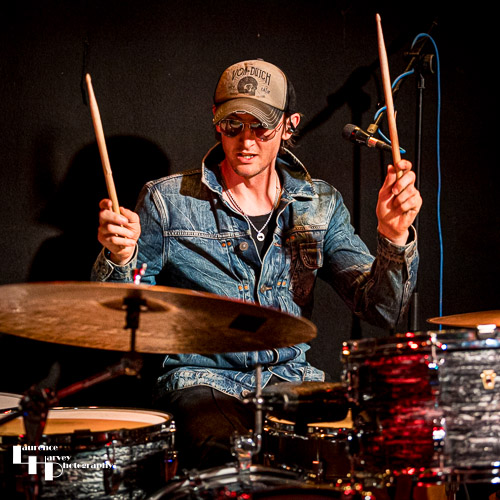 Phil Wilson on drums