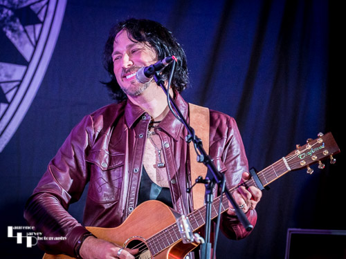Aaron Bond on guitar & vocals