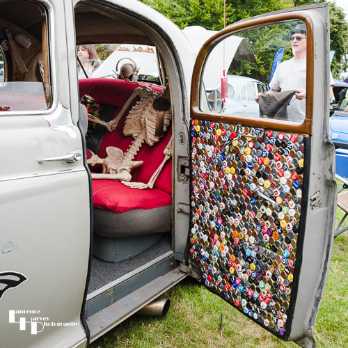 Impressive beer bottle top collection as a door liner