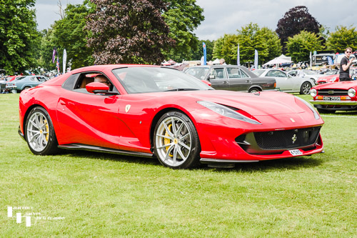 Red Ferrari (4 OXO) on the move